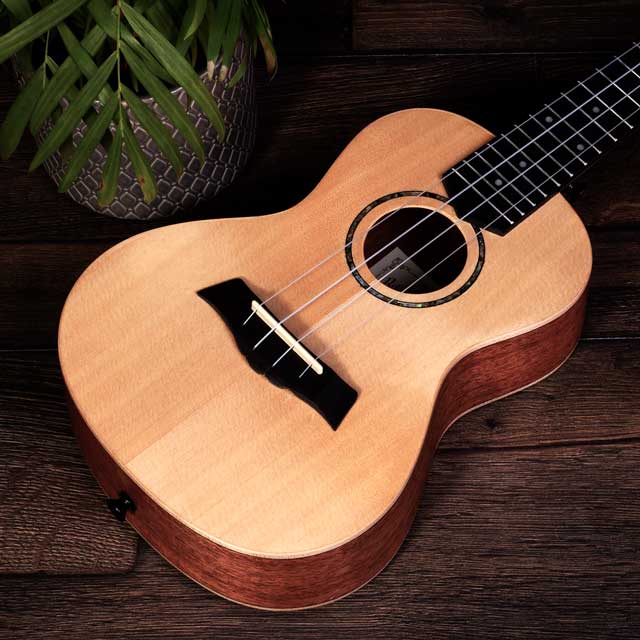 How do I strum the ukulele?